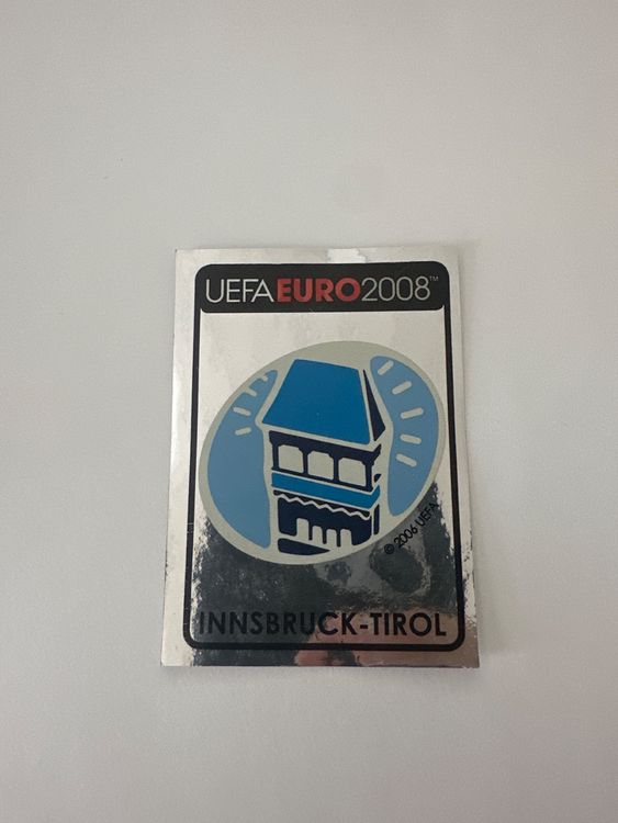 Panini UEFA EURO 2008 – Nr. 7 – Innsbruck-Tirol Logo – Schweizer Edition – Originalfoto Vorderseite