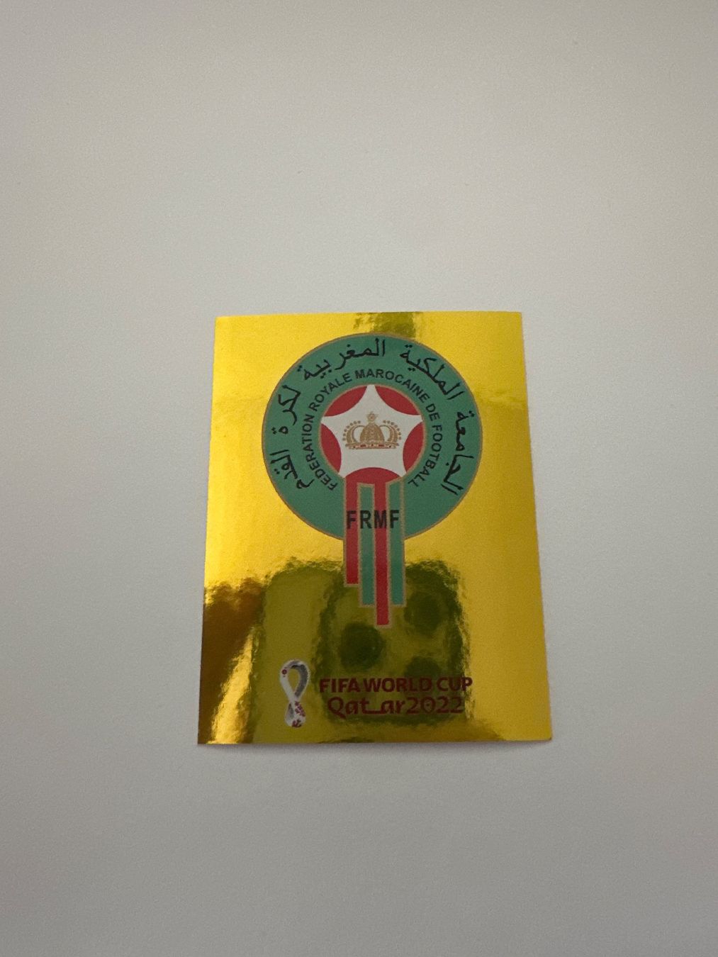 Panini FIFA WM 2022 Oryx - MAR 2 - Team Logo - Morocco – Original-Zustandsfoto Vorderseite
