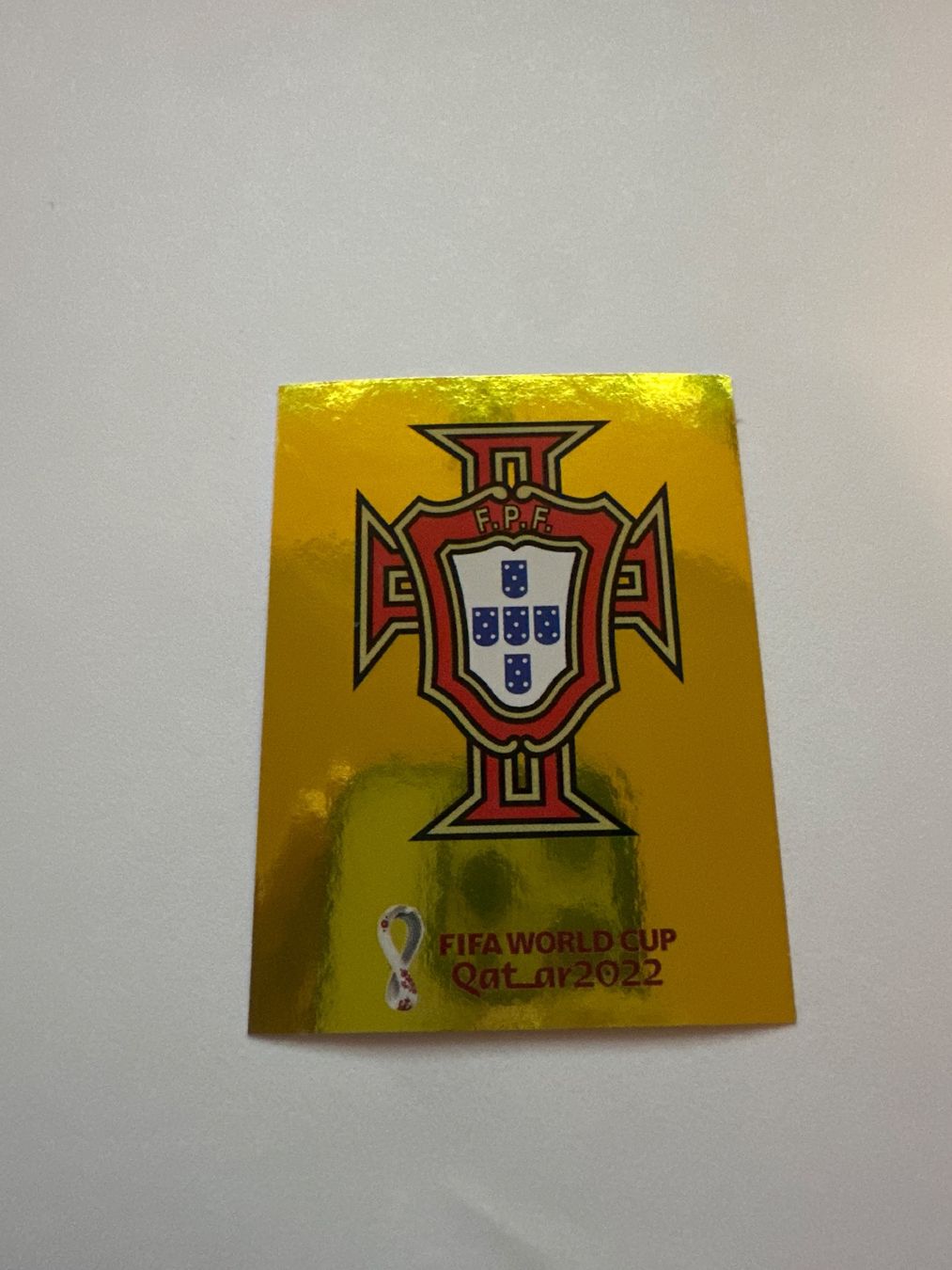 Panini FIFA WM 2022 Oryx - POR 2 - Team Logo - Portugal – Original-Zustandsfoto Vorderseite